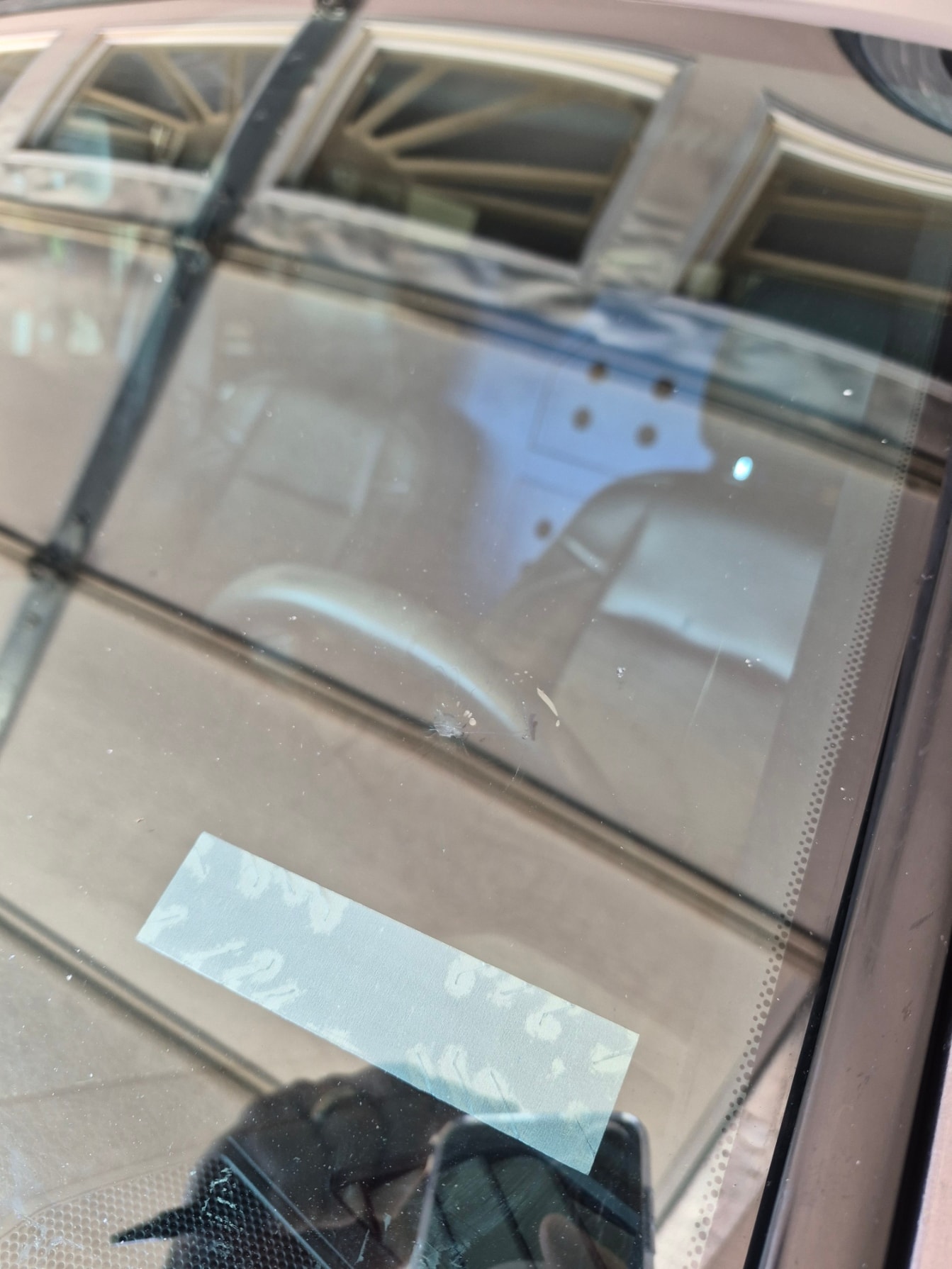 Windshield chip repaired and clear