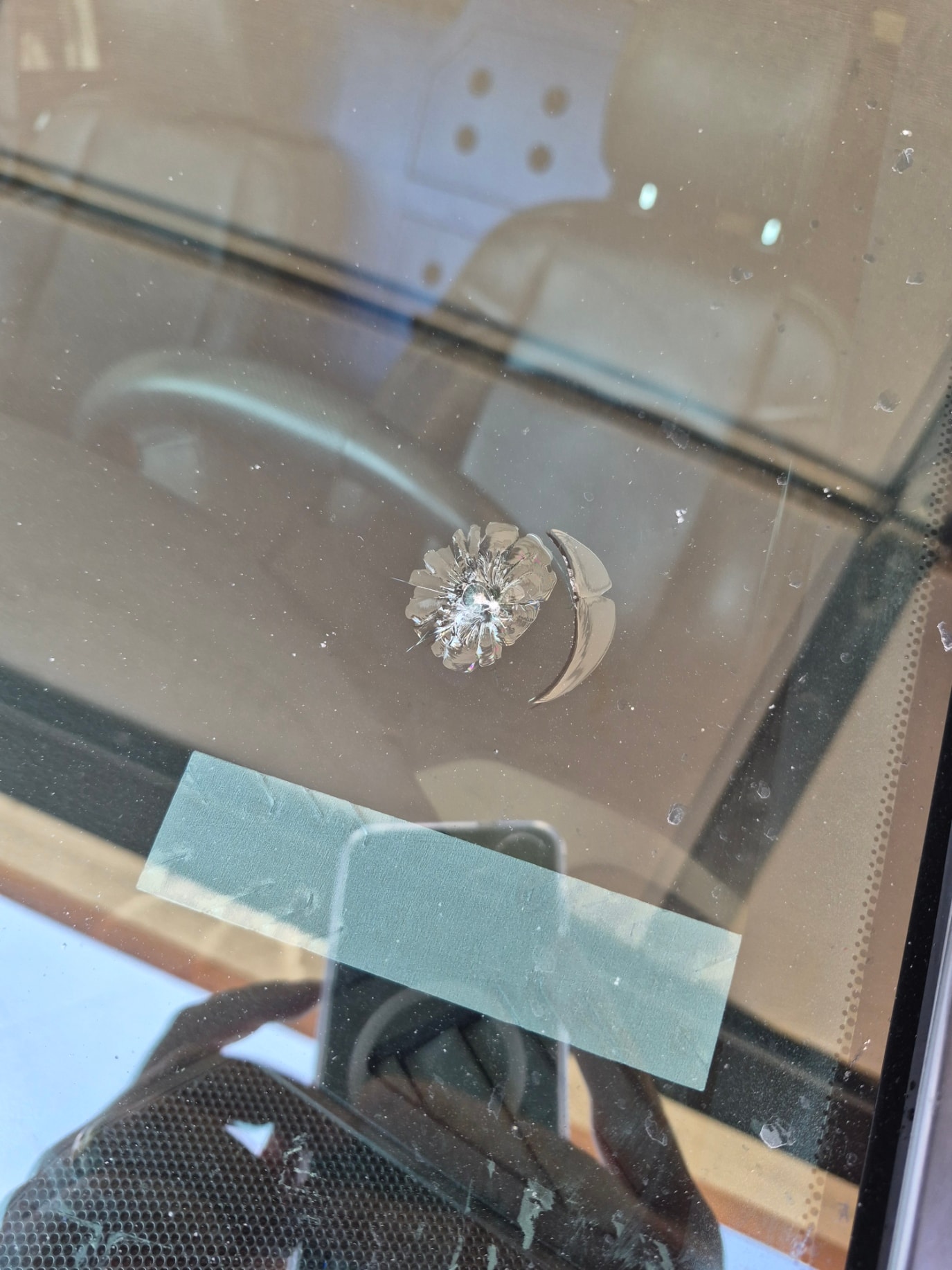 Windshield chip damage before repair