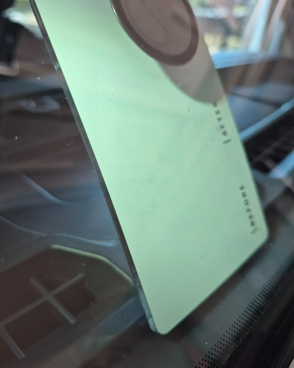 The same windshield after an on-site crack repair, with the crack much less visible