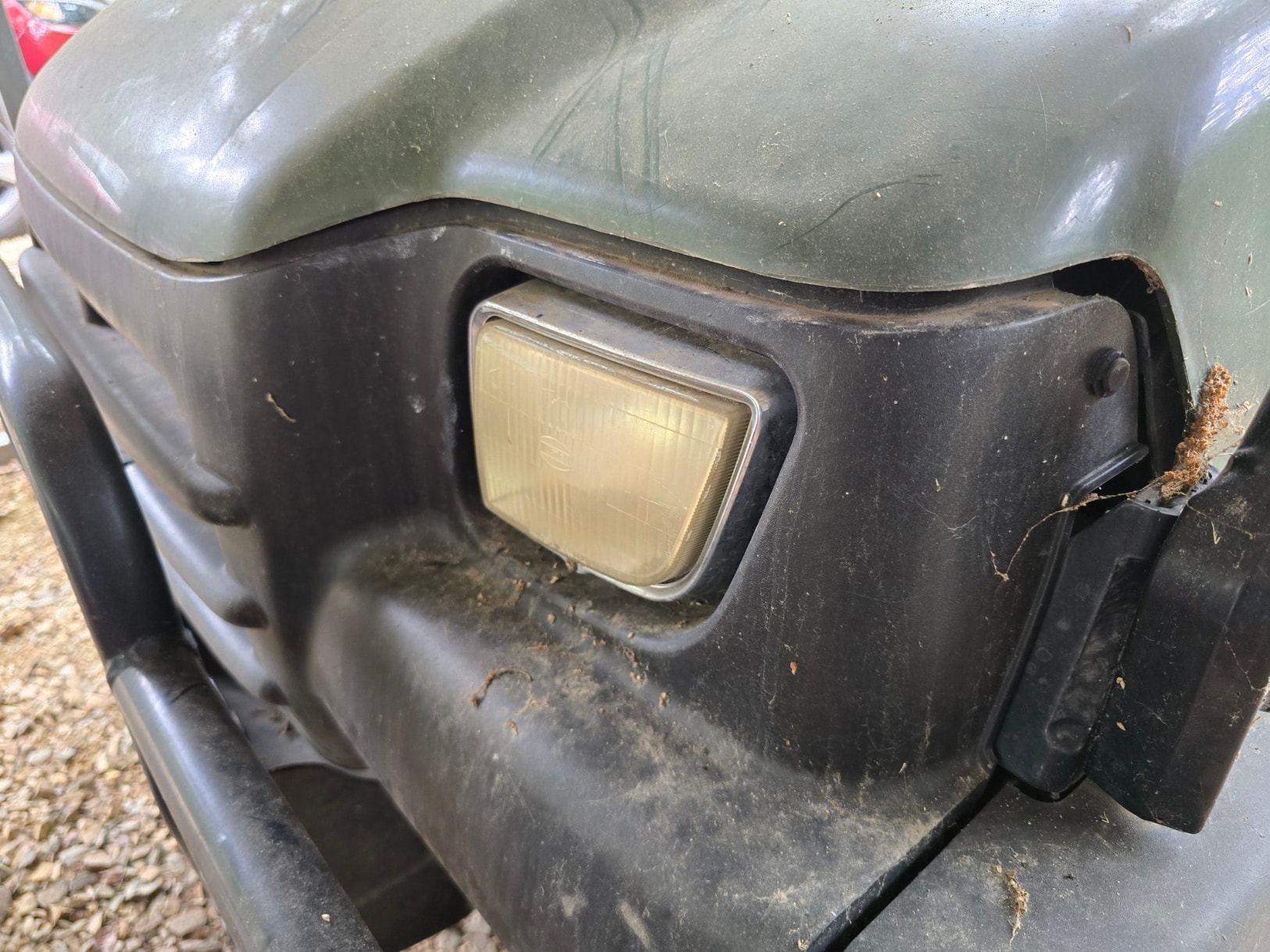 Yellowed, oxidized UTV headlights before restoration